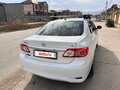 2011 Toyota Corolla X (E140, E150) Рестайлинг, белый, 970000 рублей - вид 2