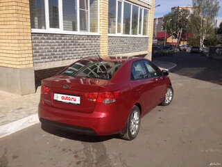 2010 Kia Cerato 6-speed II, красный, 820000 рублей, вид 2