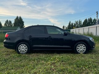 2015 Volkswagen Jetta VI Рестайлинг, чёрный, 900000 рублей, вид 4