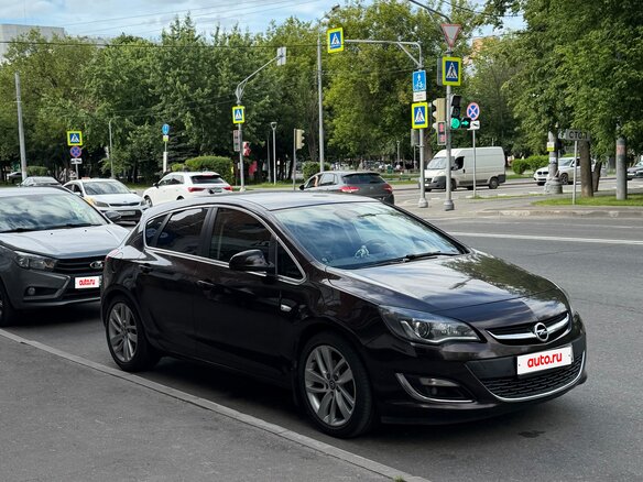 2014 Opel Astra J Рестайлинг, коричневый, 1360000 рублей - вид 13