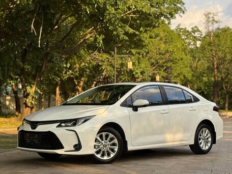 2021 Toyota Corolla XII (E210), белый, 1630000 рублей, вид 2
