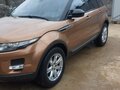 2014 Land Rover Range Rover Evoque 9-speed I, золотистый - вид 2