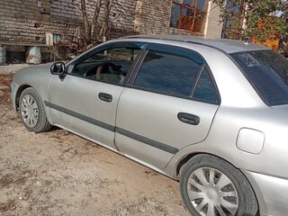 2003 Mitsubishi Carisma I Рестайлинг, серебристый, 240000 рублей, вид 4