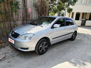 2004 Toyota Corolla IX (E120, E130), серебристый, 650000 рублей, вид 1