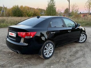 2011 Kia Cerato 6-speed II, чёрный, 670000 рублей, вид 3