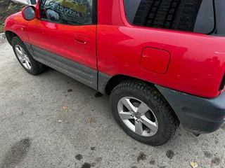 1999 Toyota RAV4 I (XA10), красный, 650000 рублей, вид 3