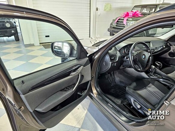 2012 BMW X1 20d I (E84), коричневый - вид 8