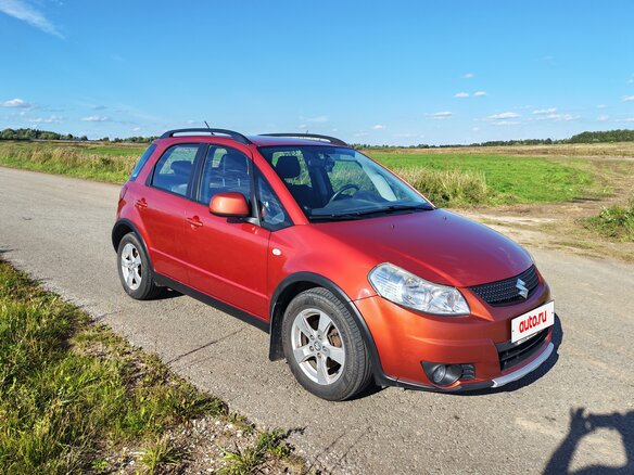 2010 Suzuki SX4 I (Classic) Рестайлинг, оранжевый - вид 2