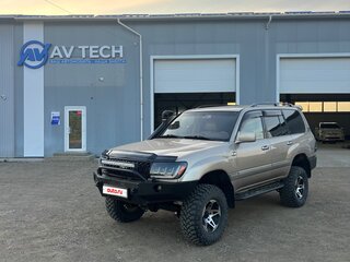 2004 Toyota Land Cruiser 105 100 Series Рестайлинг 1, золотистый, 4000000 рублей, вид 1
