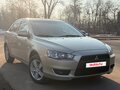 2008 Mitsubishi Lancer X, бежевый, 670000 рублей - вид 2