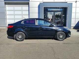 2012 Kia Rio 5-speed III, чёрный, 579000 рублей, вид 4