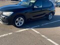 2012 BMW X1 18i I (E84) Рестайлинг, чёрный - вид 2