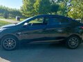 2013 Hyundai Solaris I, чёрный, 1030000 рублей - вид 9