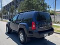 2010 Nissan Xterra II Рестайлинг, синий - вид 5