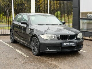 2009 BMW 1 серии 116i I (E81/E82/E87/E88) Рестайлинг, чёрный, 749000 рублей, вид 1