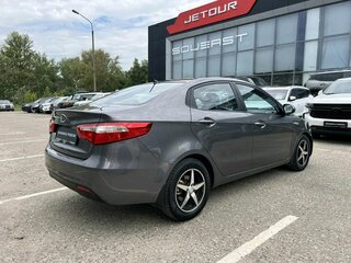 2012 Kia Rio 4-speed III, серый, 849000 рублей, вид 5