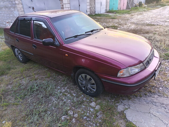 2007 Daewoo Nexia I, пурпурный, 140000 рублей - вид 2