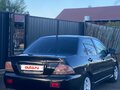 2007 Mitsubishi Lancer IX Рестайлинг, чёрный, 250000 рублей - вид 2