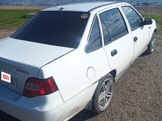 2010 Daewoo Nexia I Рестайлинг, белый, 199000 рублей, вид 5