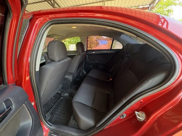 2008 Mitsubishi Lancer X, красный, 600000 рублей - вид 13