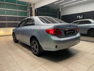 2009 Toyota Corolla X (E140, E150), голубой, 990000 рублей, вид 5