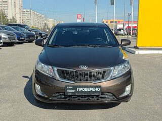 2014 Kia Rio 6-speed III, коричневый, 825000 рублей, вид 2