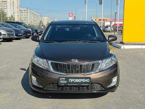 2014 Kia Rio 6-speed III, коричневый, 825000 рублей - вид 1