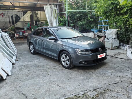 2011 Volkswagen Jetta VI, серый, 980000 рублей, вид 3