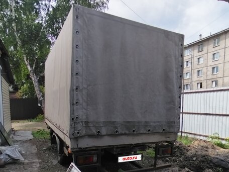 2007 Isuzu Elf (N-series), белый, 1350000 рублей, вид 4