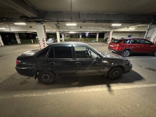 2010 Daewoo Nexia I Рестайлинг, чёрный, 90000 рублей, вид 2