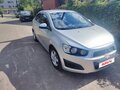 2012 Chevrolet Aveo II, серебристый, 570000 рублей
