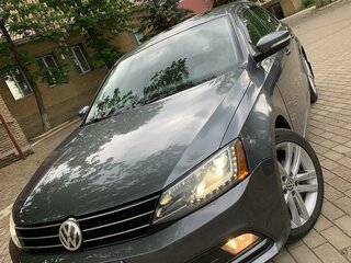 2015 Volkswagen Jetta VI Рестайлинг, серый, 1800000 рублей, вид 2