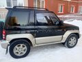 1996 Mitsubishi Pajero Junior, чёрный, 450000 рублей - вид 2