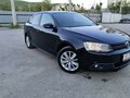 2013 Volkswagen Jetta VI, чёрный, 1200000 рублей - вид 1