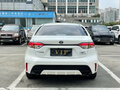2023 Toyota Corolla Sporty XII (E210), белый, 1699000 рублей - вид 4