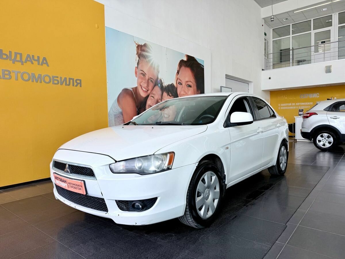 Открыть фотографии: Mitsubishi Lancer X