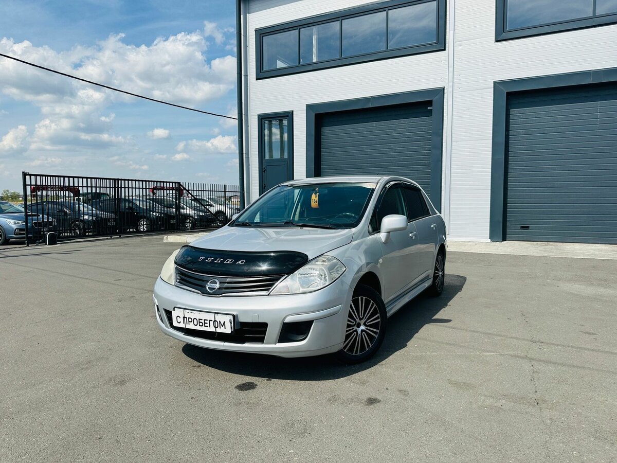 Открыть фотографии: Nissan Tiida I Рестайлинг