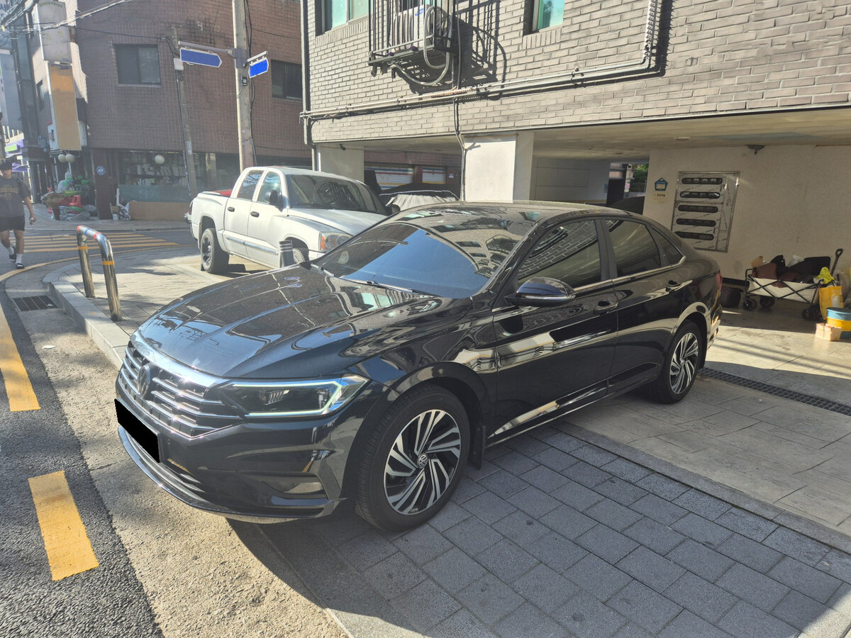 Открыть фотографии: Volkswagen Jetta VII