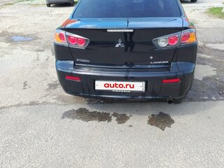 2013 Mitsubishi Lancer X Рестайлинг, чёрный, 700000 рублей, вид 2