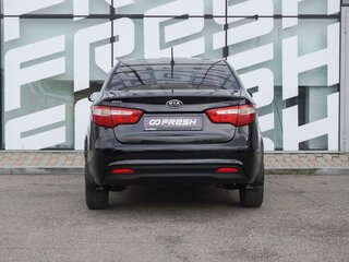 2012 Kia Rio 5-speed III, чёрный, 696000 рублей, вид 4