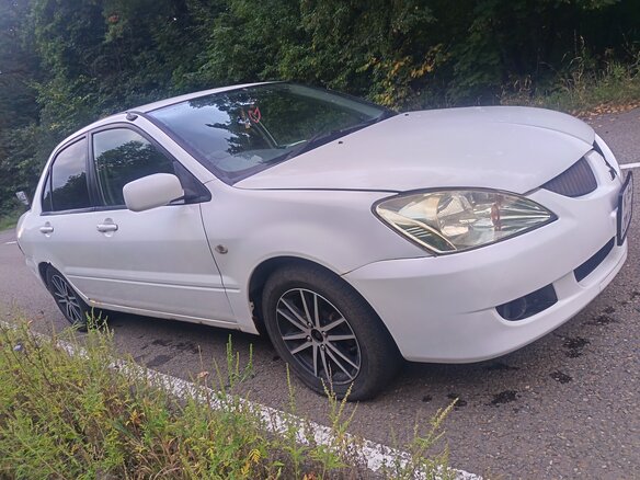 2003 Mitsubishi Lancer Cedia IX, белый, 350000 рублей - вид 11