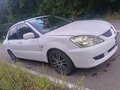 2003 Mitsubishi Lancer Cedia IX, белый, 350000 рублей - вид 11