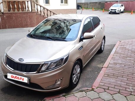 2012 Kia Rio 4-speed III, бежевый, вид 1