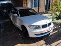 2007 BMW 1 серии 116i I (E81/E82/E87/E88) Рестайлинг, белый, 949000 рублей - вид 1
