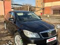 2011 Skoda Octavia II (A5) Рестайлинг, чёрный, 575000 рублей - вид 1