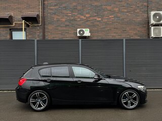 2015 BMW 1 серии 118i II (F20/F21) Рестайлинг, чёрный, 1475000 рублей, вид 1