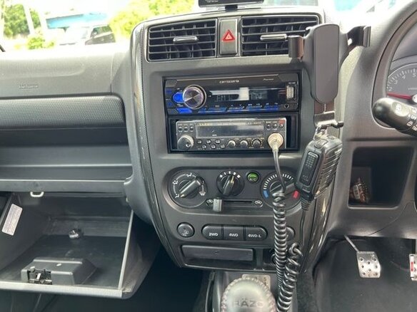 2013 Suzuki Jimny Kei car III Рестайлинг 2, белый - вид 8
