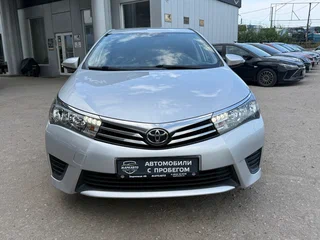 2014 Toyota Corolla XI (E160, E170, E180), серебристый, 1340000 рублей, вид 4