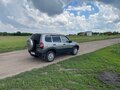 2012 Chevrolet Niva I Рестайлинг, серый, 590000 рублей - вид 2
