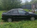 2003 Nissan Almera II (N16) Рестайлинг, чёрный, 140000 рублей - вид 1